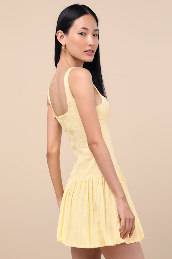 Khamari White Textured Drop Waist Bubble-Hem Mini Dress