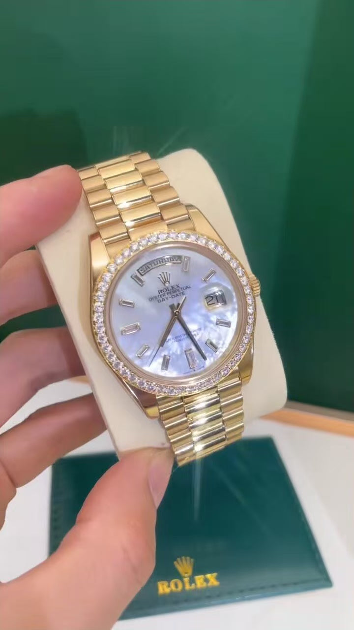 Black and Gold Daytona (Caliber 4131); Day-Date 228348 (Mother-of-Pearl Dial)